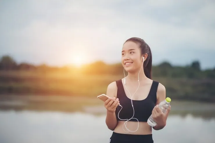 fitness-woman-earphones-listening-music-her-workout-exercise-park_1150-4223.jpg