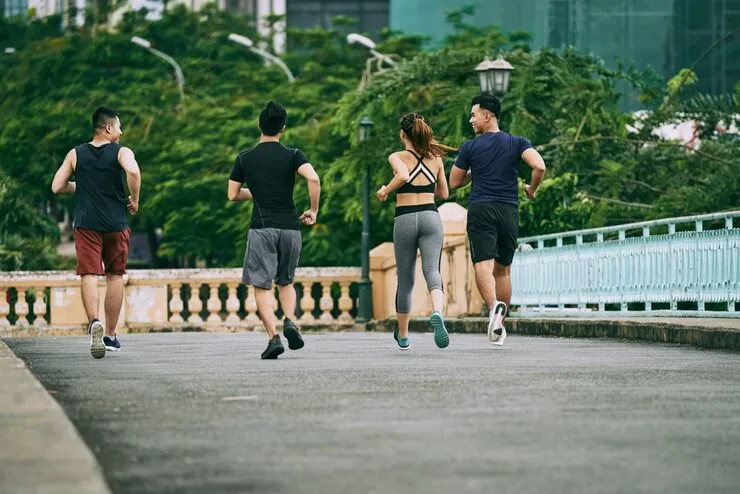 rear-view-three-man-girl-jogging-together-summer-day_1098-19266.jpg