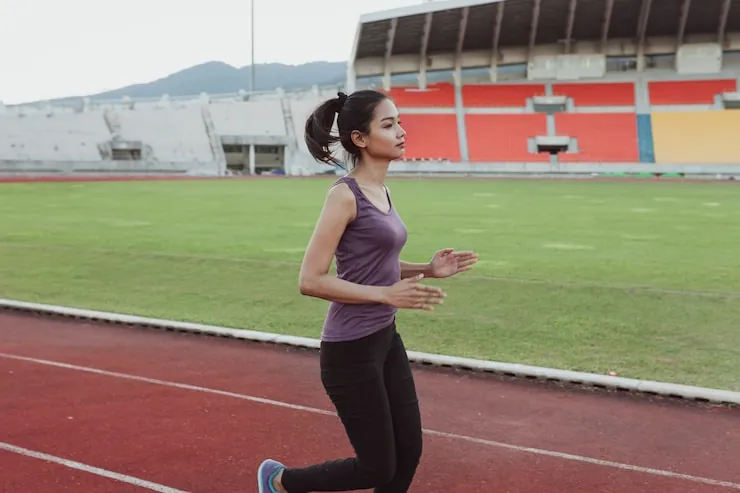 girl-training-stadium_23-2147598765.jpg